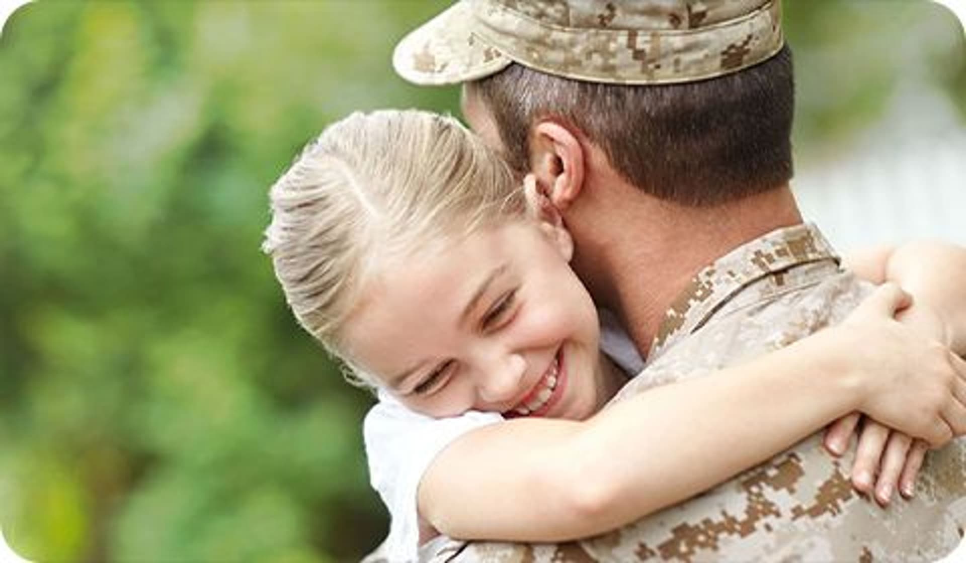 Father hugging daughter