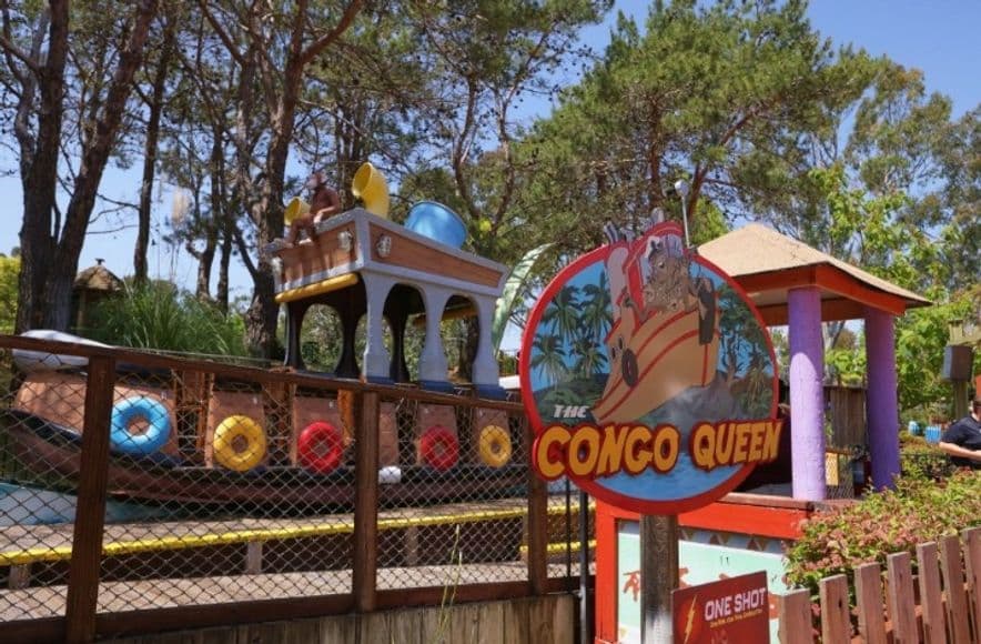 Close-up of the Congo Queen boat at Six Flags Discovery Kingdom, showcasing the ride's design and sign.