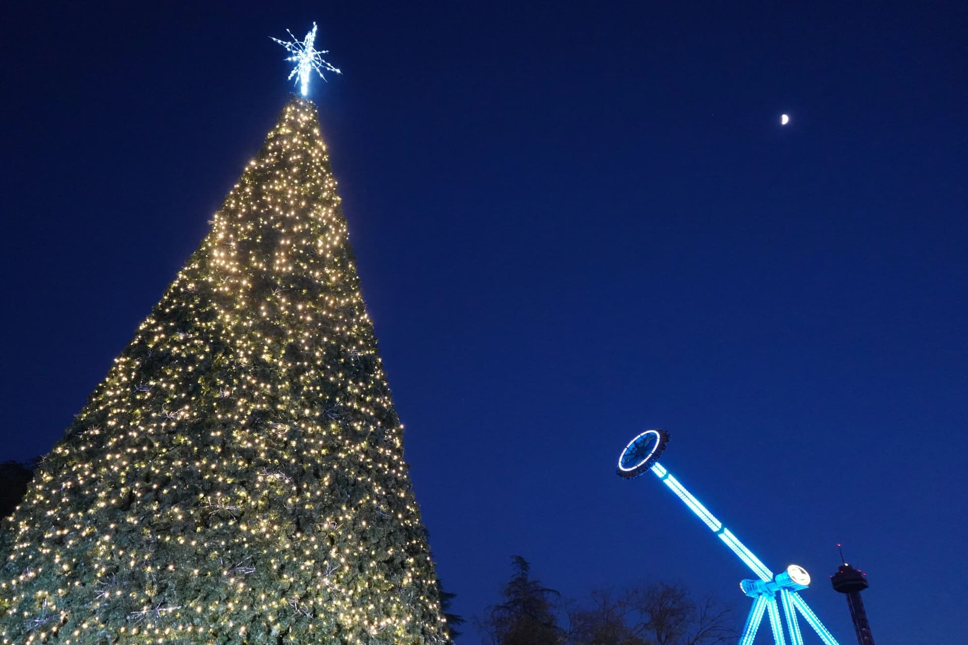 Strings or lights over a midway and on buildings