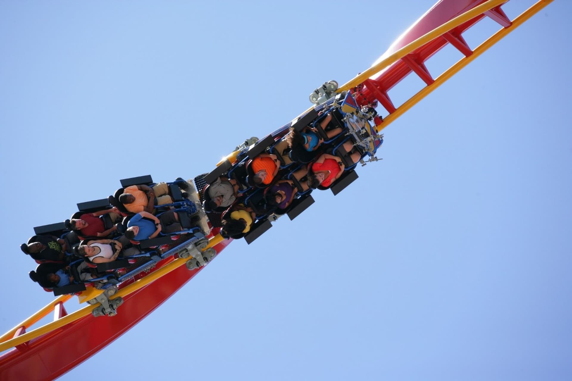 Guests enjoying one of the many twists on SUPERMAN Ultimate Flight at Six Flags Discovery Kingdom.