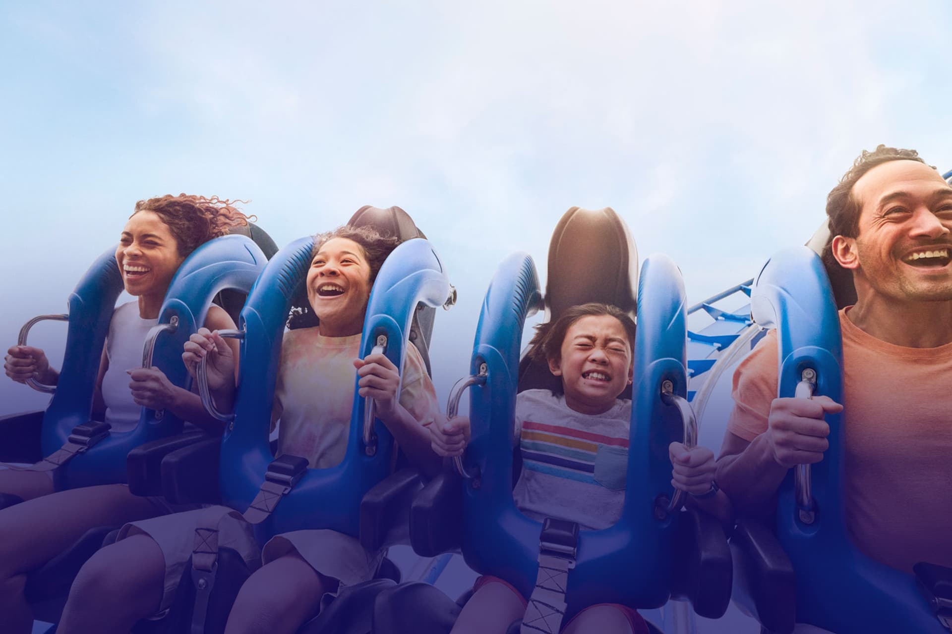 Guests riding a coaster