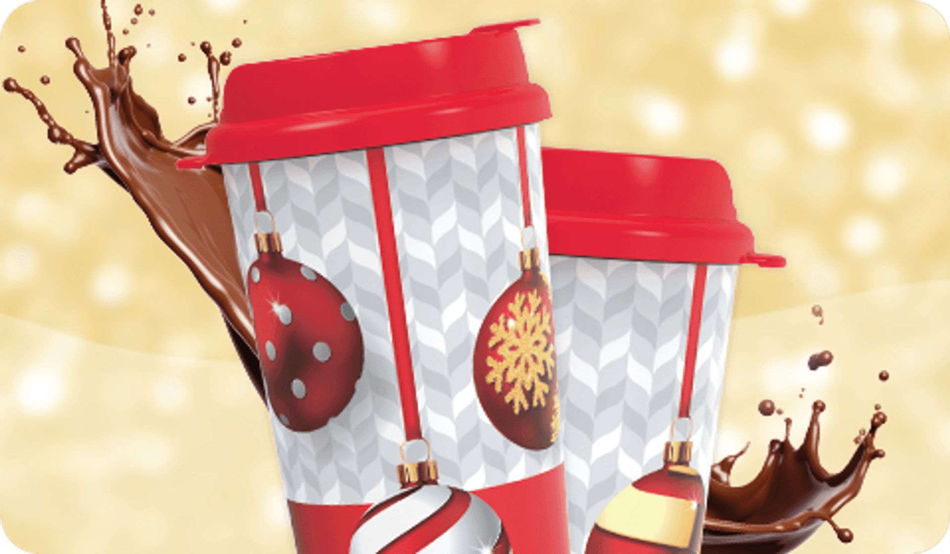 Two hot chocolate mugs with hot chocolate splashing around them