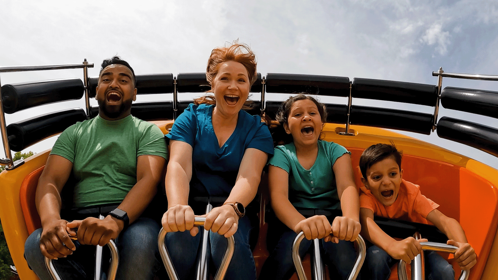 Family on roller coaster