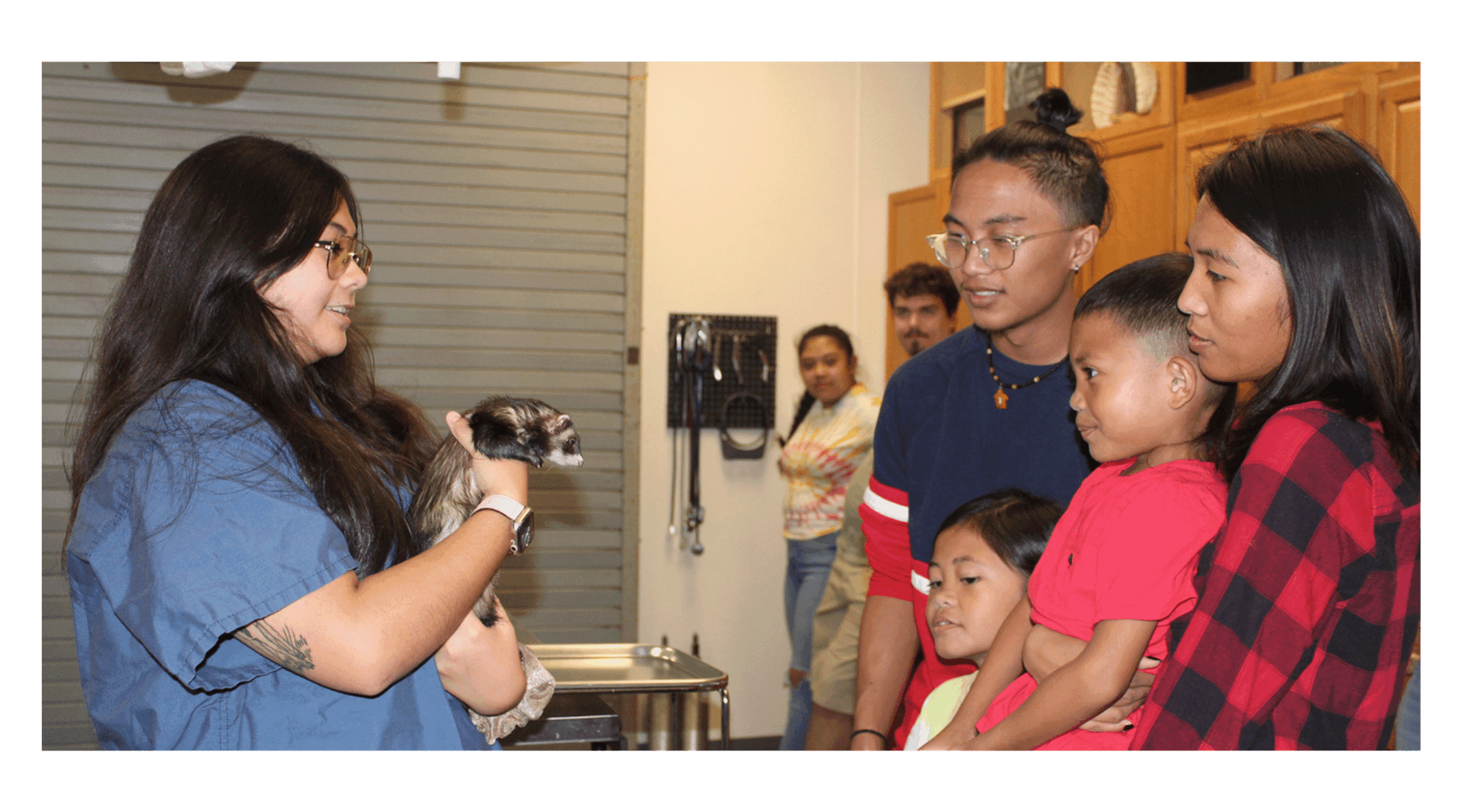 Guests learning about Six Flags animal's from park employee