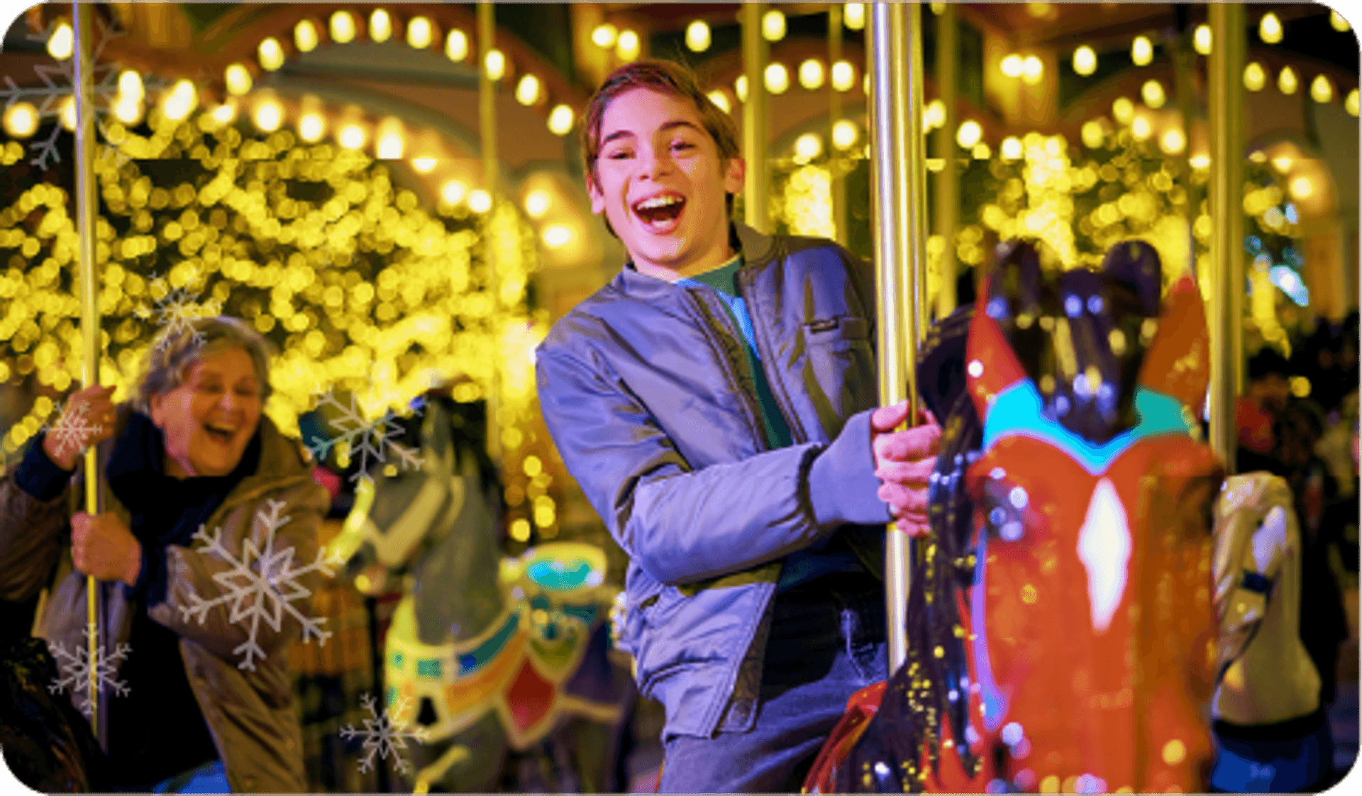 A child smiling on a carousel